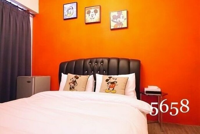 Imagen de la habitación del Hotel Mumu Inn, Taichung. Foto 17