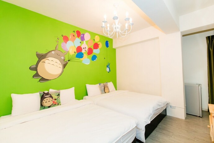Imagen de la habitación del Hotel Mumu Inn, Taichung. Foto 18