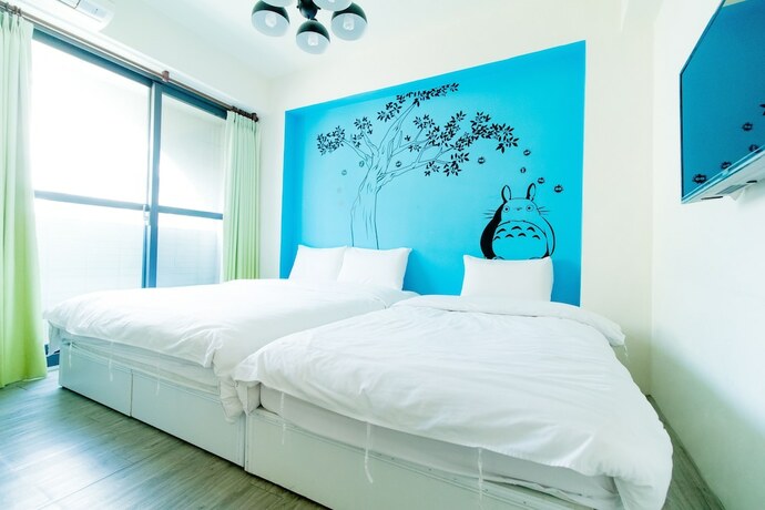Imagen de la habitación del Hotel Mumu Inn, Taichung. Foto 19