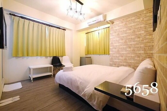 Imagen de la habitación del Hotel Mumu Inn, Taichung. Foto 21