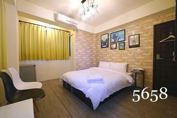 Imagen de la habitación del Hotel Mumu Inn, Taichung. Foto 22