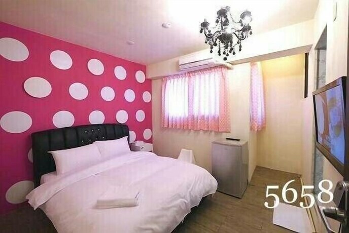 Imagen de la habitación del Hotel Mumu Inn, Taichung. Foto 23
