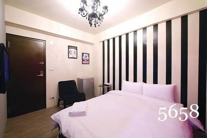Imagen de la habitación del Hotel Mumu Inn, Taichung. Foto 25