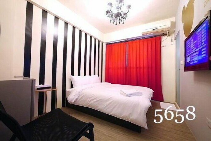 Imagen de la habitación del Hotel Mumu Inn, Taichung. Foto 29