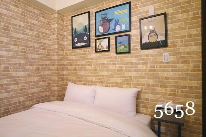 Imagen de la habitación del Hotel Mumu Inn, Taichung. Foto 32