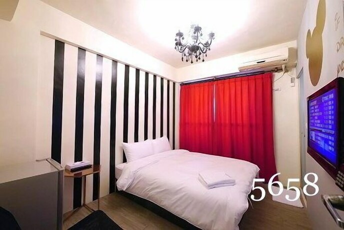 Imagen de la habitación del Hotel Mumu Inn, Taichung. Foto 33