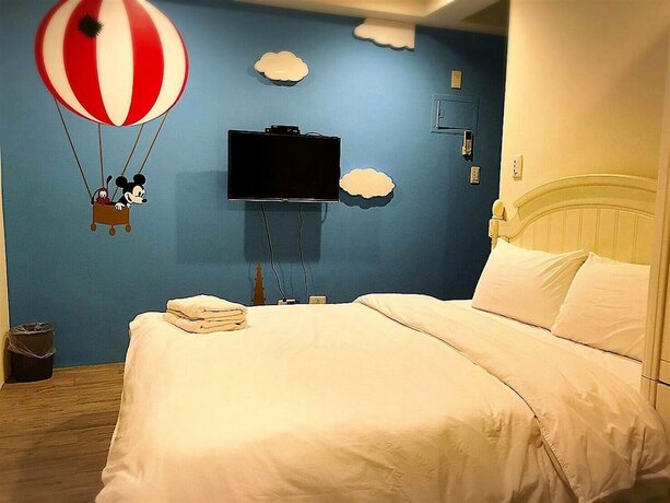 Imagen de la habitación del Hotel Mumu Inn, Taichung. Foto 35