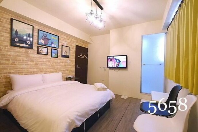 Imagen de la habitación del Hotel Mumu Inn, Taichung. Foto 36