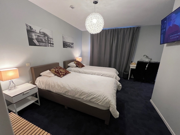 Imagen de la habitación del Hotel Munal Temse. Foto 6