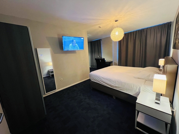 Imagen de la habitación del Hotel Munal Temse. Foto 8
