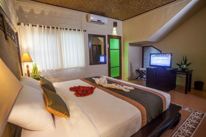 Imagen de la habitación del Hotel Munari Resort and Spa. Foto 3