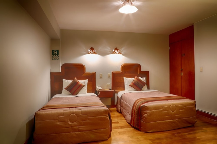 Imagen de la habitación del Hotel Munay Wasi Inn. Foto 6