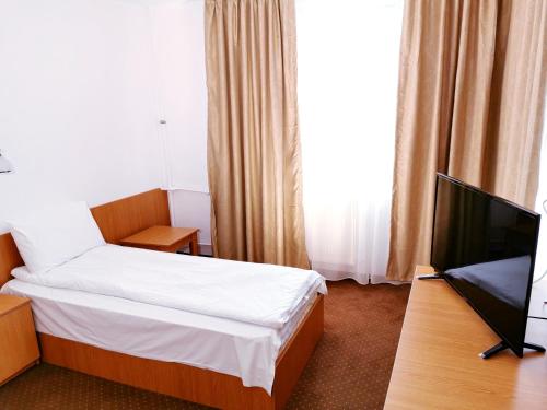 Imagen de la habitación del Hotel Muncel. Foto 20