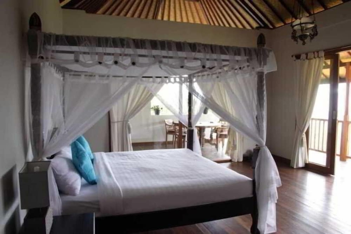 Imagen de la habitación del Hotel Munduk Sari Garden Villa. Foto 2