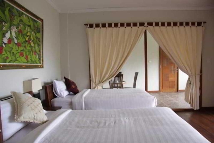 Imagen de la habitación del Hotel Munduk Sari Garden Villa. Foto 4