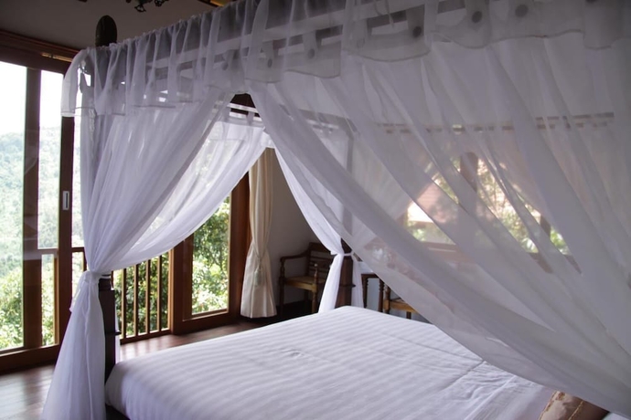 Imagen de la habitación del Hotel Munduk Sari Garden Villa. Foto 11