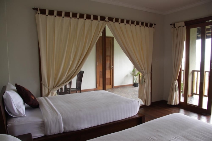 Imagen de la habitación del Hotel Munduk Sari Garden Villa. Foto 13