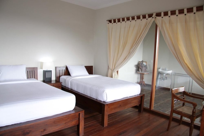 Imagen de la habitación del Hotel Munduk Sari Garden Villa. Foto 18