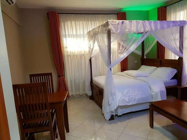 Imagen de la habitación del Hotel Munga Executive Lodge. Foto 14
