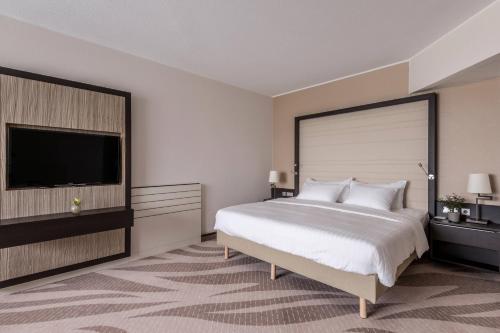 Imagen de la habitación del Hotel Munich Airport Marriott. Foto 13