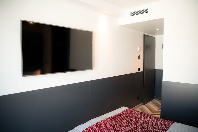 Imagen de la habitación del Hotel Munich Deluxe. Foto 7