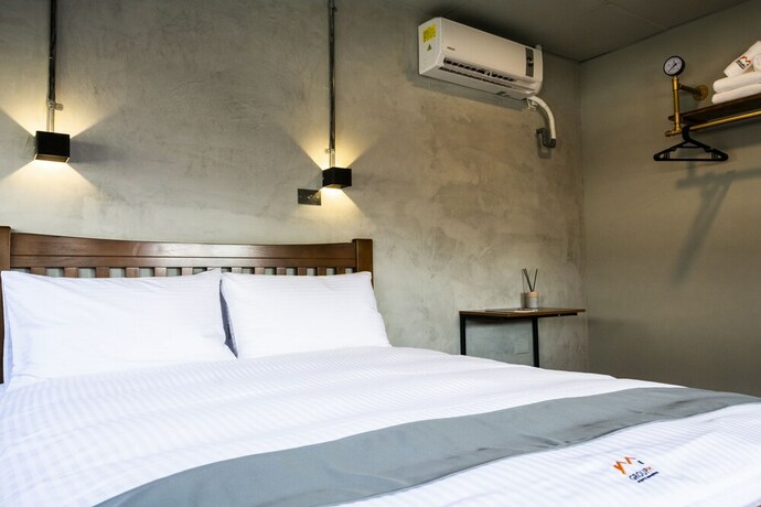 Imagen de la habitación del Hotel Munihey Inn. Foto 19