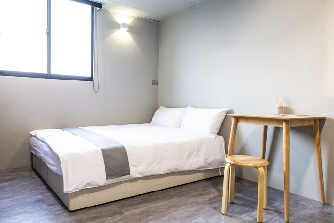 Imagen de la habitación del Hotel Munihey Inn. Foto 22