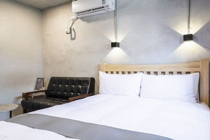 Imagen de la habitación del Hotel Munihey Inn. Foto 30