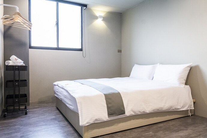 Imagen de la habitación del Hotel Munihey Inn. Foto 31