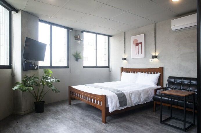 Imagen de la habitación del Hotel Munihey Inn. Foto 32
