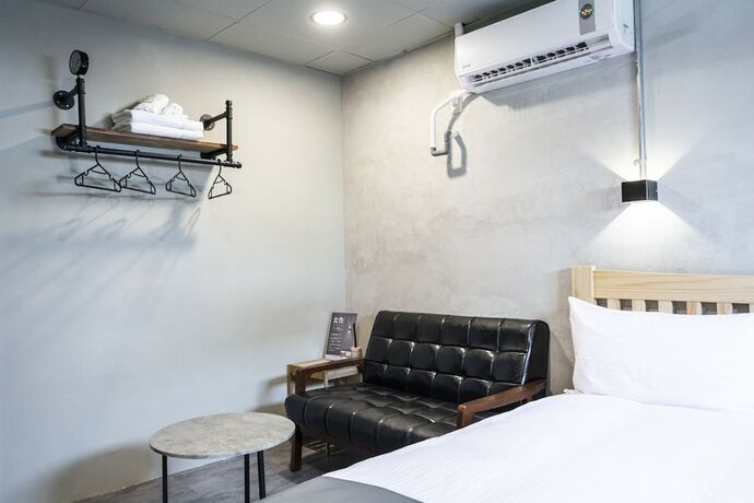 Imagen de la habitación del Hotel Munihey Inn. Foto 33