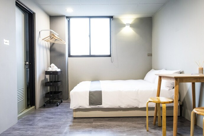 Imagen de la habitación del Hotel Munihey Inn. Foto 36