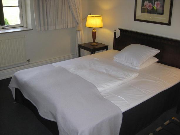 Imagen de la habitación del Hotel Munkebo Kro. Foto 9