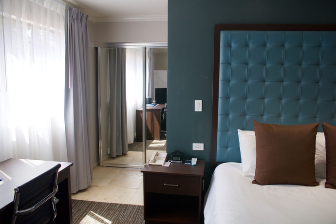 Imagen de la habitación del Hotel Munras Inn. Foto 1