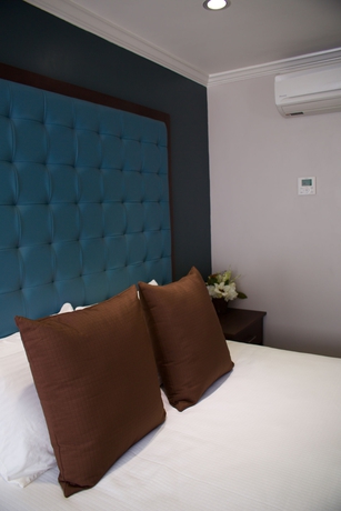 Imagen de la habitación del Hotel Munras Inn. Foto 8