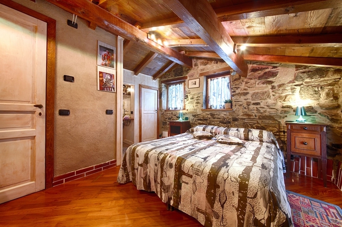 Imagen de la habitación del Hotel Munta e Cara Albergo Diffuso. Foto 6