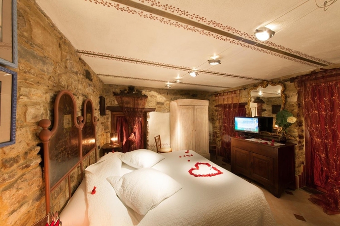 Imagen de la habitación del Hotel Munta e Cara Albergo Diffuso. Foto 9