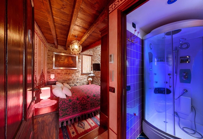 Imagen de la habitación del Hotel Munta e Cara Albergo Diffuso. Foto 11