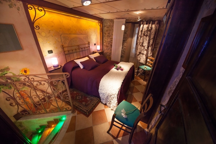 Imagen de la habitación del Hotel Munta e Cara Albergo Diffuso. Foto 12