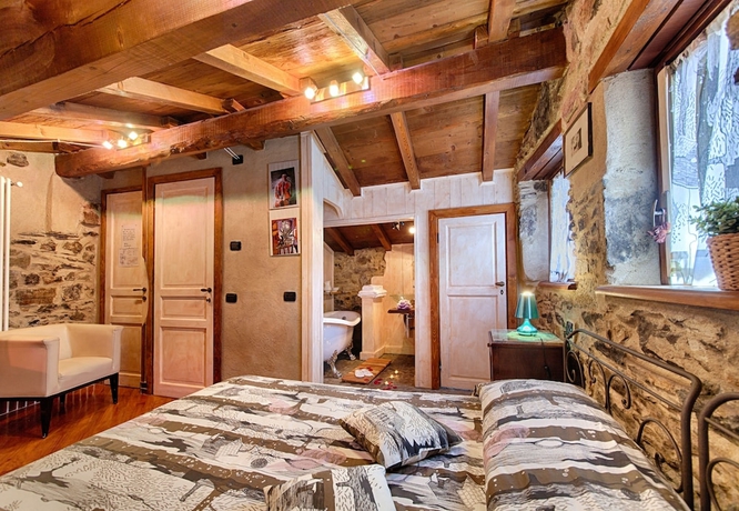 Imagen de la habitación del Hotel Munta e Cara Albergo Diffuso. Foto 14