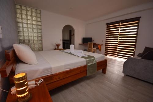 Imagen de la habitación del Hotel Munting Paraiso. Foto 7