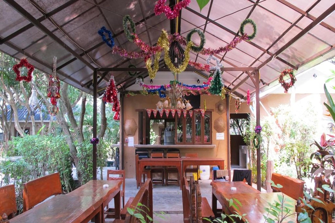 Imagen del bar/restaurante del Hotel Muntra Garden Resort. Foto 3