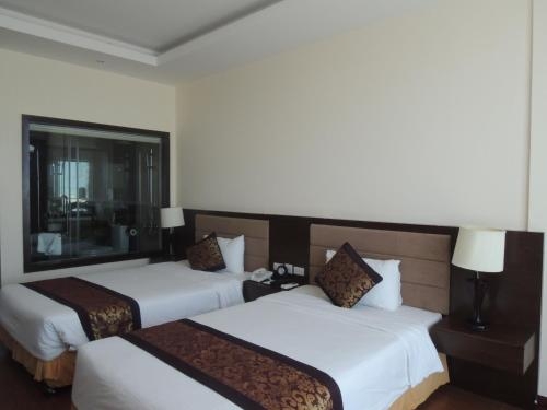 Imagen de la habitación del Hotel Muong Thanh Holiday Quang Binh. Foto 6