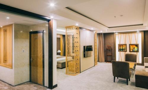 Imagen de la habitación del Hotel Muong Thanh Luxury Nhat Le. Foto 6