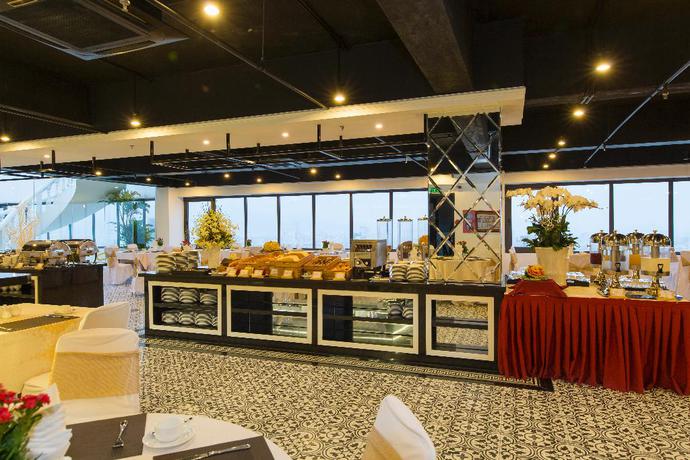 Imagen del bar/restaurante del Hotel Muong Thanh Luxury Song Han Hotel. Foto 1