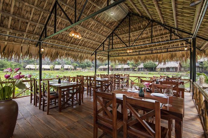 Imagen del bar/restaurante del Hotel Muong Village Ninh Binh. Foto 7