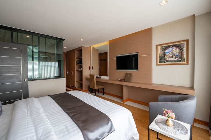 Imagen de la habitación del Hotel Muq. Foto 15