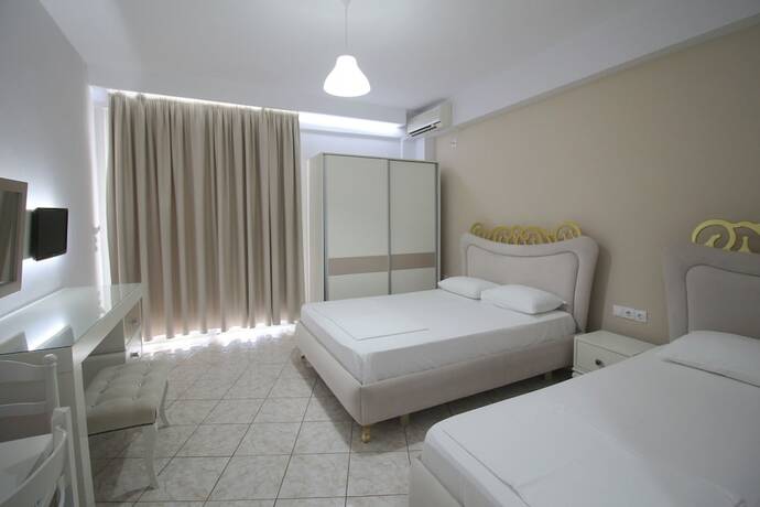 Imagen de la habitación del Hotel Murati Suites Sarande. Foto 20