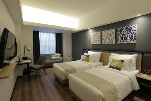 Imagen de la habitación del Hotel Muraya Hotel Aceh. Foto 6