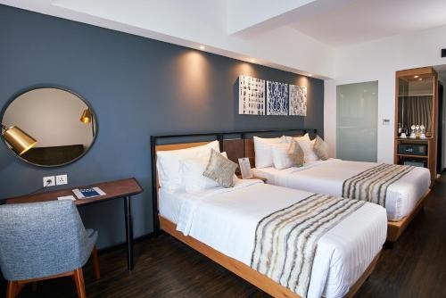 Imagen de la habitación del Hotel Muraya Hotel Aceh. Foto 8